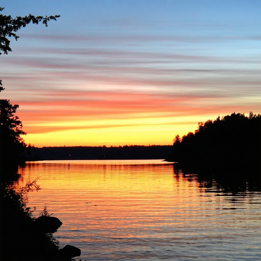 Sunset on the lake Island in the background